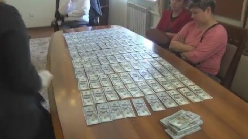 Якобы взятка Болата Халыка - деньги его родственника, лежавшие в сейфе.