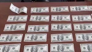 Поддельные $100 по 15 тыс. тенге за купюру продавали в Алматинской области