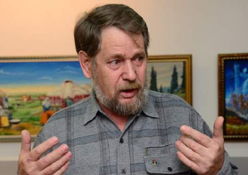 Художник, что рисует град